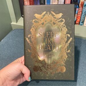 Sleep Like Death by Kalynn Bayron — Olive Green Hardcover with Gold Foil